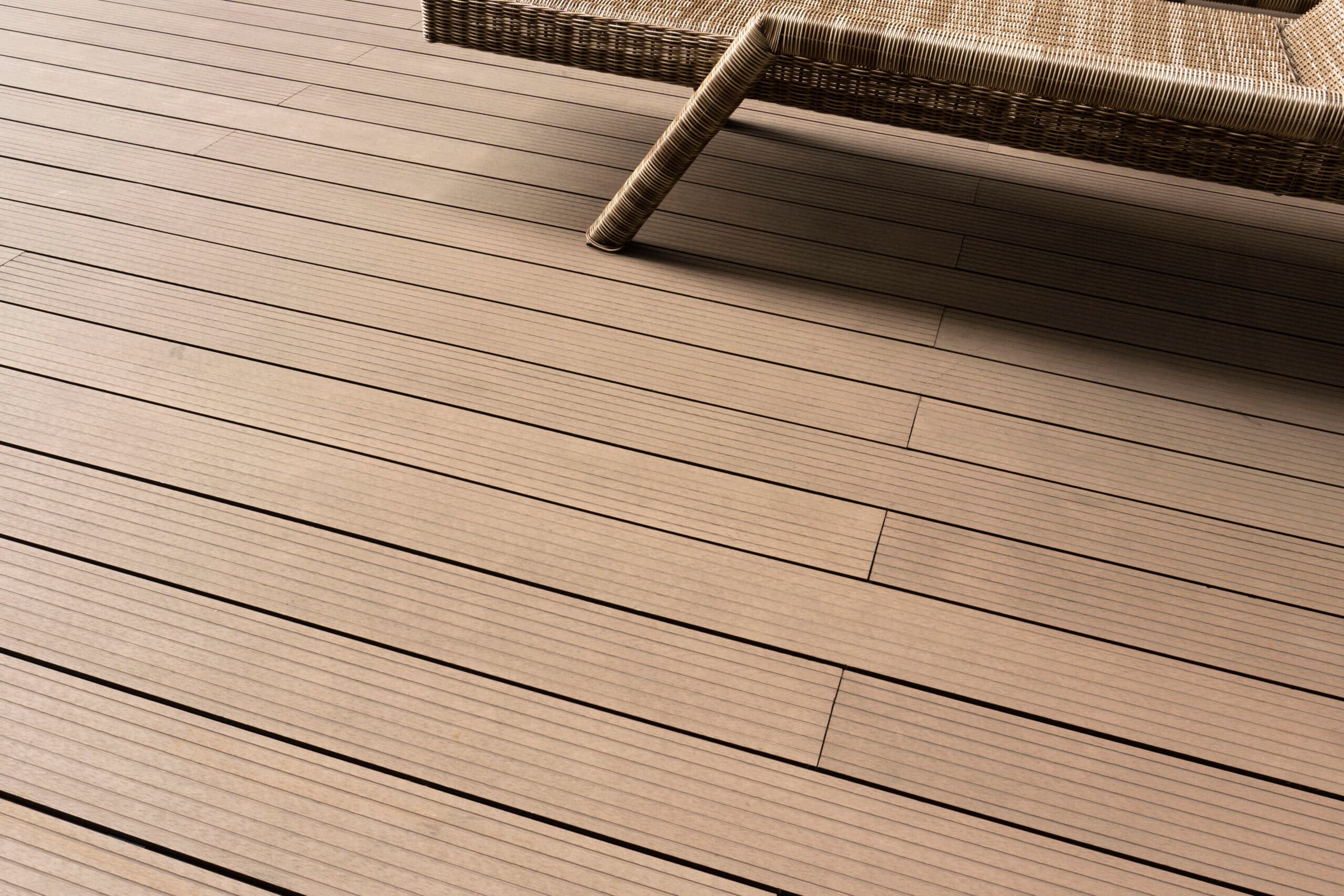 Close-up of premium wood texture used in Kaizen villas.